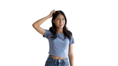 Young Asian woman thinking hard or planning to do something, Overthinking or worrying, Have a headache, Migraine, Stress, Free space for advertising or promoting products, Copy space, Enter text. clipart