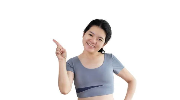 Asian Woman Pointing Finger Inviting Click Here Recommended Follow Direction — стоковое фото