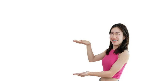 Asian Woman Holding Copyspace Imaginary Palm Insert Showing Copyspace Pointing — Foto Stock