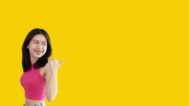 Asian woman pointing finger inviting click here, It is recommended to follow this direction or click on this link, Space for promotion here, Register or apply for membership, Click here.