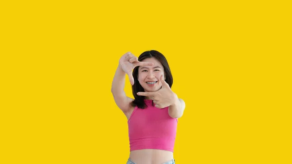 Playful Young Asian Woman Good Mood Posing Photo Photo Frame — Foto de Stock