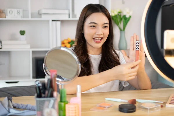 Beautiful women with social media influences recommend products and make-up accessories to be more beautiful, Recording vlog video live streaming, Online business of beauty bloggers.