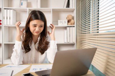 Young woman stressed or worried about doing a wrong job, Despair or disappointment, Sad feeling, Suffering, Desperate, Hopeless, Fail, disastrous, bankrupt, Scared, panicky, Failure of life.
