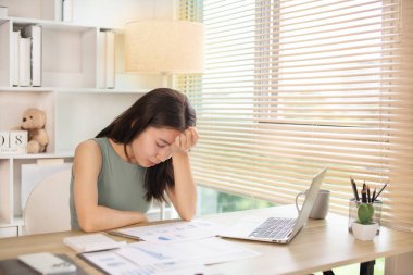 Young woman stressed or worried about doing a wrong job, Despair or disappointment, Sad feeling, Suffering, Desperate, Hopeless, Fail, disastrous, bankrupt, Scared, panicky, Failure of life.