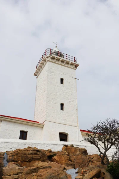White Stone Lighthouse Tower On Rock With Overcast Sky, Mossel Bay, South Africa