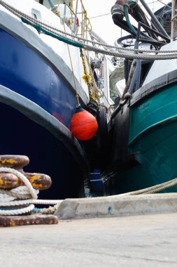Trawler Boats With Fishing Equipment In Harbor