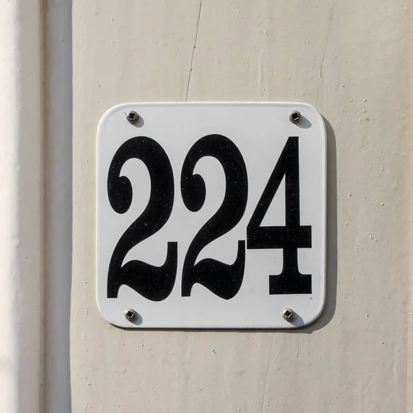 Casa Número 224 Tipo Preto Fundo Branco — Fotografia de Stock