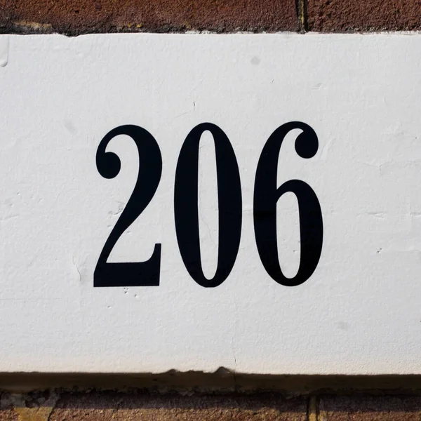 Klej Litery Dom Numer 206 Białym Tle — Zdjęcie stockowe