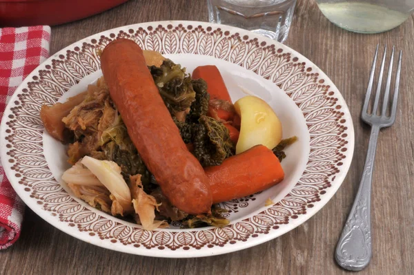 stock image Cabbage hotpot served on a plate with a fork close-up