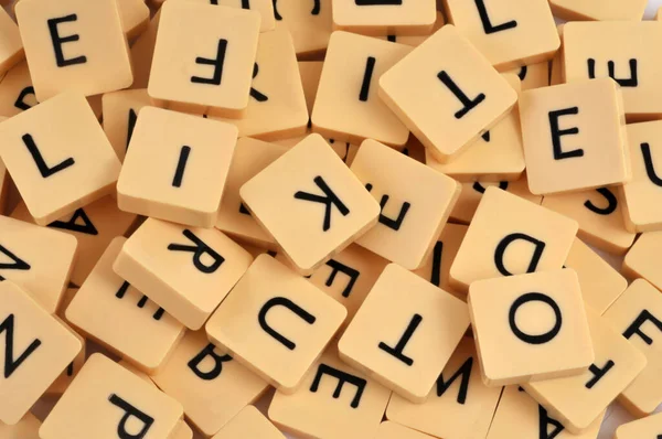 stock image Letters of a Scrabble game shuffled close-up