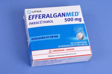 Box of Efferalgan 500 close up on blue background