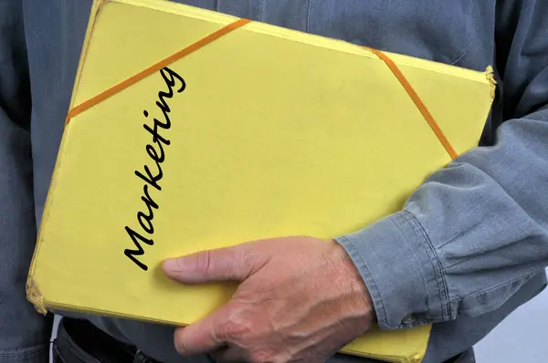 Marketing Folder Held Hand Close — Stock Photo, Image