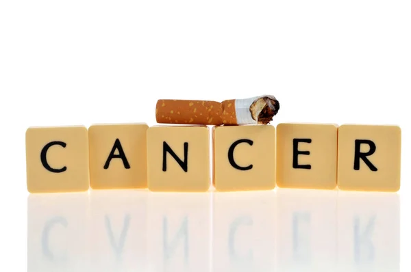 Cancer Concept Alphabet Letters Cigarette Butt White Background — Zdjęcie stockowe