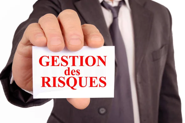 Üzletember Aki Francia Nyelven Írt Kockázatkezelési Kártyával Rendelkezik — Stock Fotó