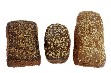 Beyaz arkaplandaki tohum ekmeklerinin çeşitliliği