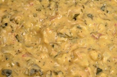 Homemade bearnaise sauce close-up on background