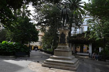 Bronze statue of Emilio Castelar, politician and writer, located in Plaza Candelaria in Cadiz clipart