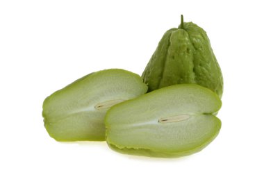 Halved chayote and whole chayote closeup isolated on white background clipart