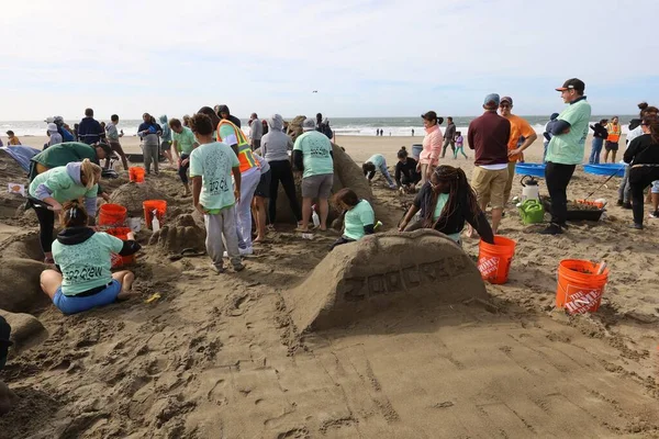 stock image 10-15-2022:San Francisco, California: SandKastle tournament in San Francisco. People making sand scultpures in teams