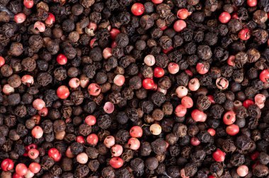 Siyah ve pembe biberli arka plan. Boşluğu kopyala.