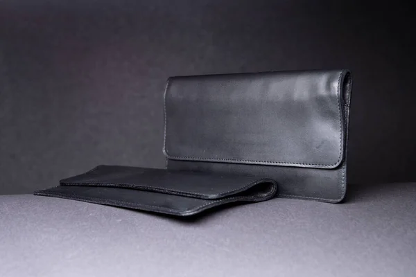 Black Leather Vertical Wallets Men Smooth Glossy Texture Grey Surface — Stock Photo, Image