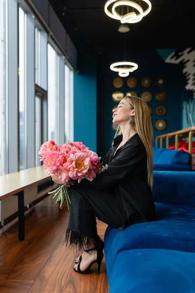 Blonde Woman Enjoys Fragrant Smell Bouquet Break Room Female Employee Royalty Free Stock Images