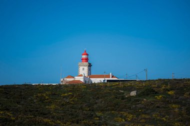 Lighthouse building at Cape Roca on the Atlantic coast of Portugal. 