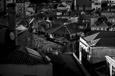 View of the rooftops of old city, in Porto, Portugal. Black and white photo.