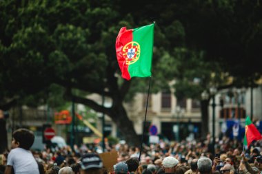 PORTO, PORTUGAL  APR 25, 2024: Freedom Parade during the celebration 50 years of Carnation Revolution, a.k.a. the 25 April. It was a military coup by left-leaning military officers on 25 April 1974 clipart