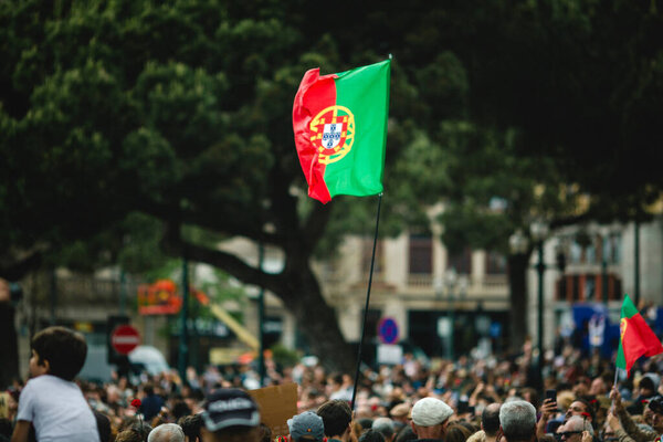 PORTO, PORTUGAL  APR 25, 2024: Freedom Parade during the celebration 50 years of Carnation Revolution, a.k.a. the 25 April. It was a military coup by left-leaning military officers on 25 April 1974