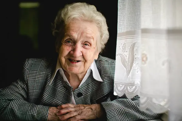 stock image A portrait of an elderly lady in her home.