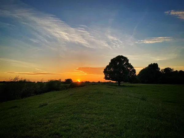 looking along the river bank to the setting sun