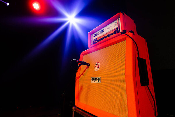 Lviv, Ukraine - November 2, 2022: Guitar Speaker Cabinets - Orange Amp on concert stage