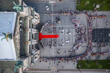 Lviv, Ukraine - August 12, 2021: Opening of  the 122nd theater season of the Lviv National Opera. Aerial view from drone clipart