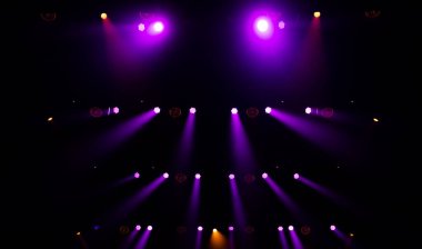 Colorful concert lights on empty stage for design purpose
