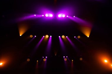 Colorful concert lights on empty stage for design purpose