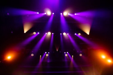 Colorful concert lights on empty stage for design purpose