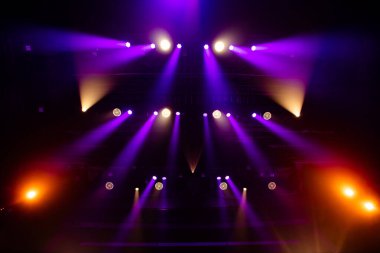 Colorful concert lights on empty stage for design purpose