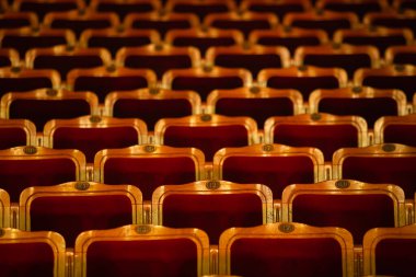Row of red seats in theatre for design purpose