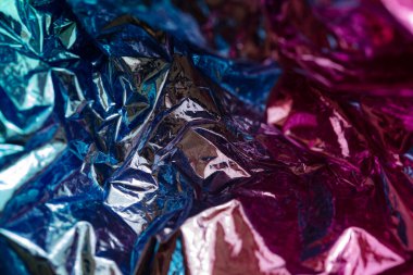 Closeup of colorful wrinkled metallic textured background for design purpose