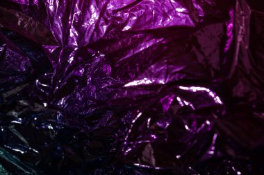 Closeup of colorful wrinkled metallic textured background for design purpose