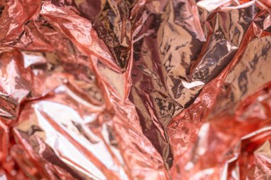 Closeup of colorful wrinkled metallic textured background for design purpose