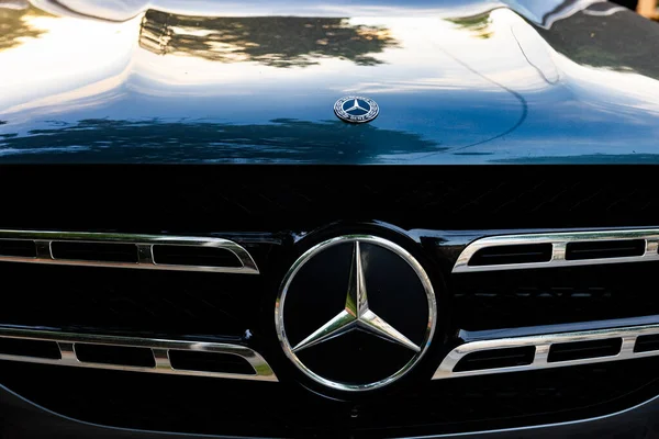 stock image Stuttgart, Germany - June, 2023: Mercedes-Benz sign on black car