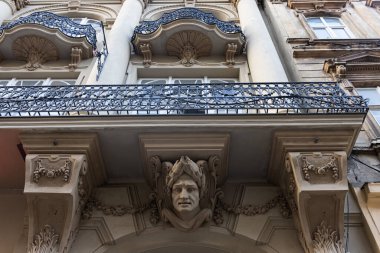 Closeup of ancient building, reliefs, caryatids