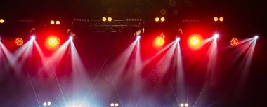 Colorful concert lights on empty stage for design purpose