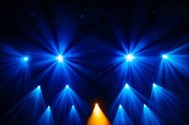 Colorful concert lights on empty stage for design purpose