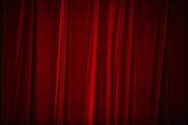 Red curtain in theatre. Textured background clipart