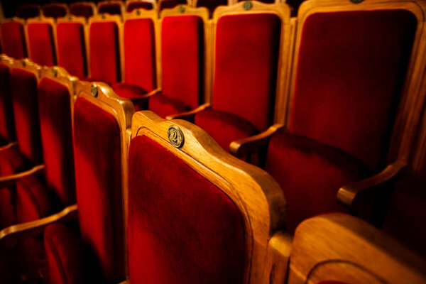 Row of red seats in theatre