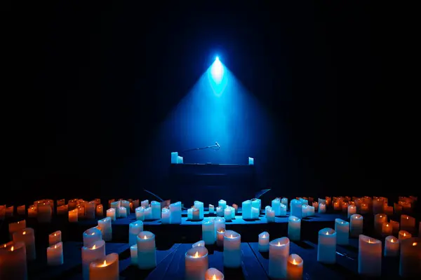piano on stage with lots of candles for design purpose
