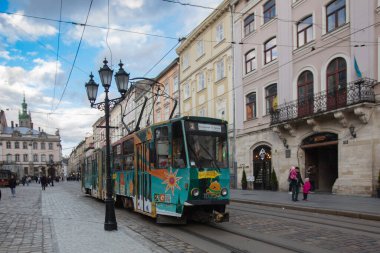 Lviv, Ukraine - March 20, 2024: Tram on  Market square in Lviv, Ukraine clipart